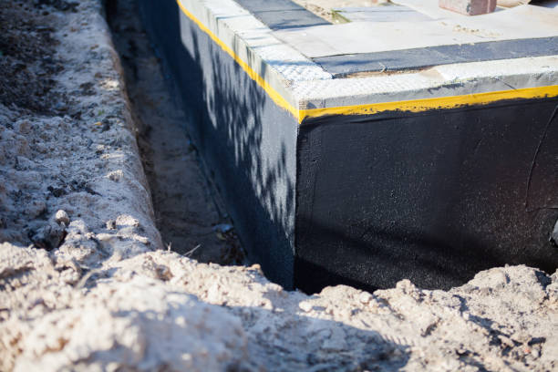 Professional Basement Waterproofing technician working in Point Lookout, NY